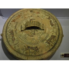 Different designs of crosses, solar discs and swastikas